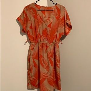 Knee length orange and beige dress